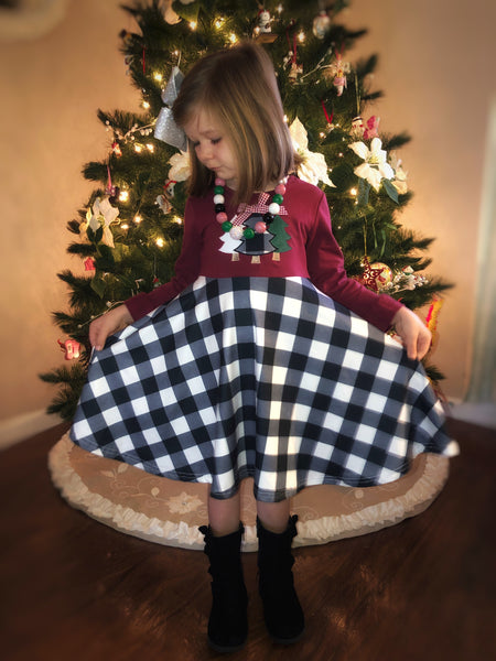 Buffalo plaid twirl dress + Green ruffle legging